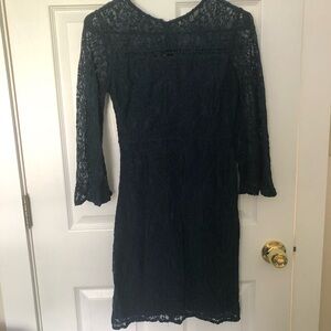 Lace cocktail dress with bell sleeves